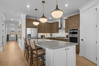 Open-concept living room with hardwood floors